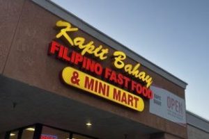 100% MART Kapit Town Square